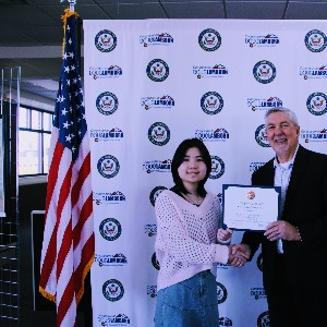 Student accepting award for Congressional Art